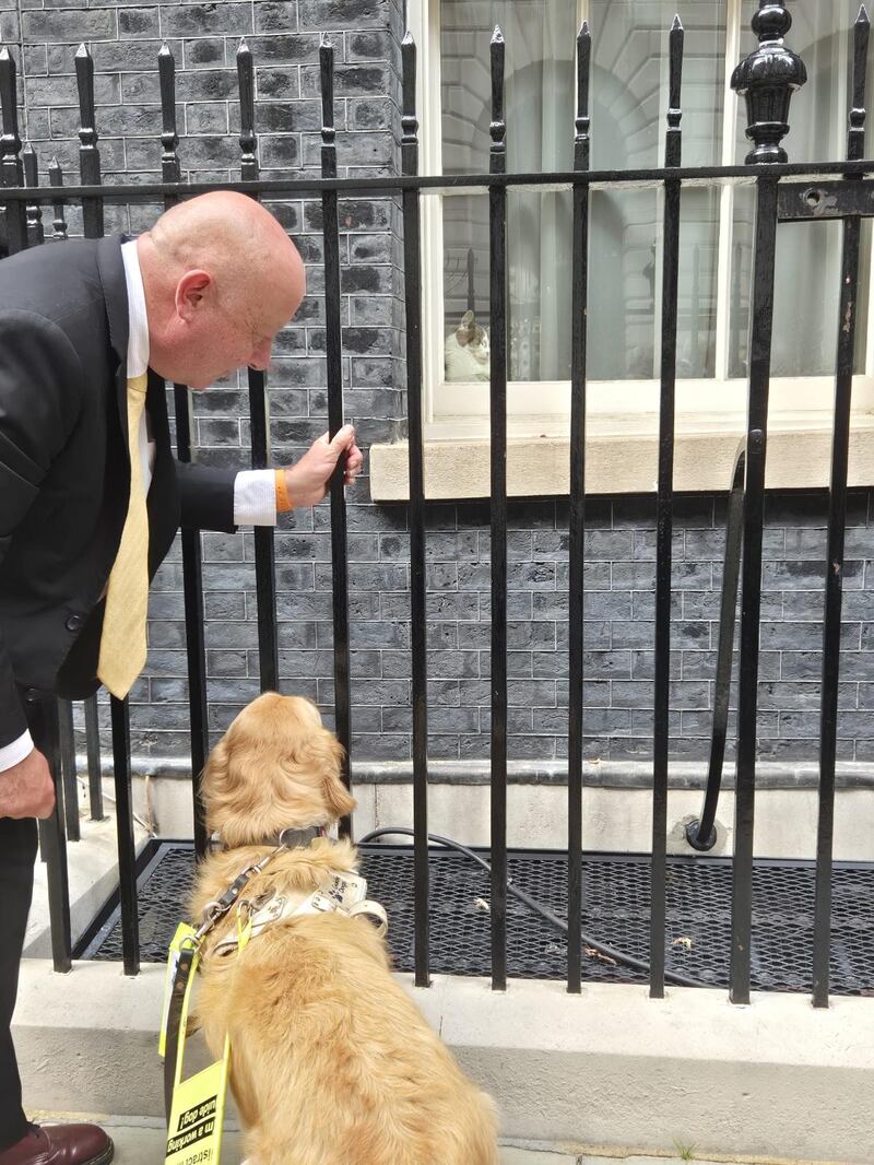 Jennie meets a disinterested Larry the Cat in Downing Street