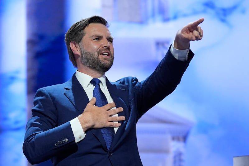 JD Vance stands on stage after speaking on the third day of the Republican National Convention in Milwaukee (Evan Vucci/AP)