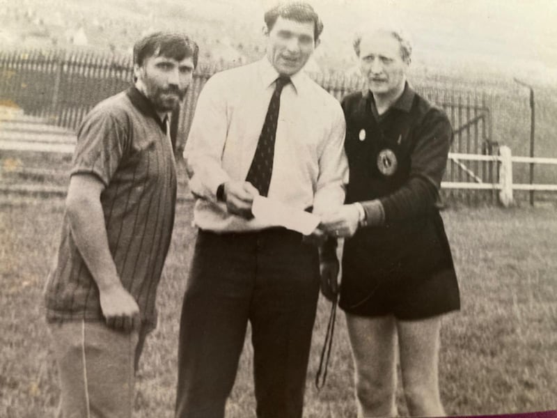 Seamus O'Hare with leading Antrim referees Gerry McClory (left) and John Gough