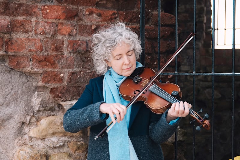 Bríd Harper playing her violin