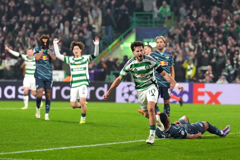 Nicolas Kuhn, centre, celebrates his second goal