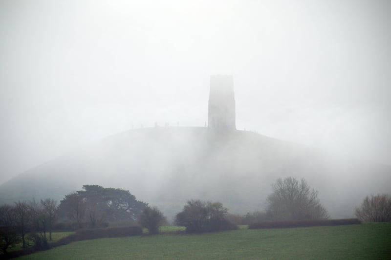 Foggy conditions at St Michael’s Tower on top of Glastonbury Tor, Somerset, ahead of New Year celebrations