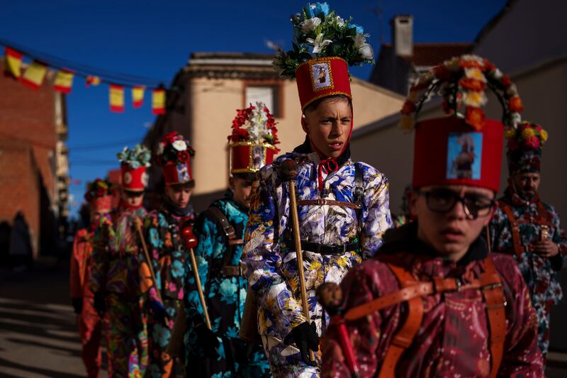 Only men born in the village or their descendants are part of the brotherhood (AP Photo/Manu Fernandez)