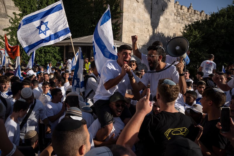 Israelis shout slogans (Leo Correa/AP)