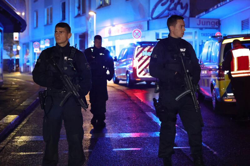 Police and ambulances near the scene where people were killed and injured in an attack at a festival in Solingen, western Germany (Gianni Gattus/dpa via AP)