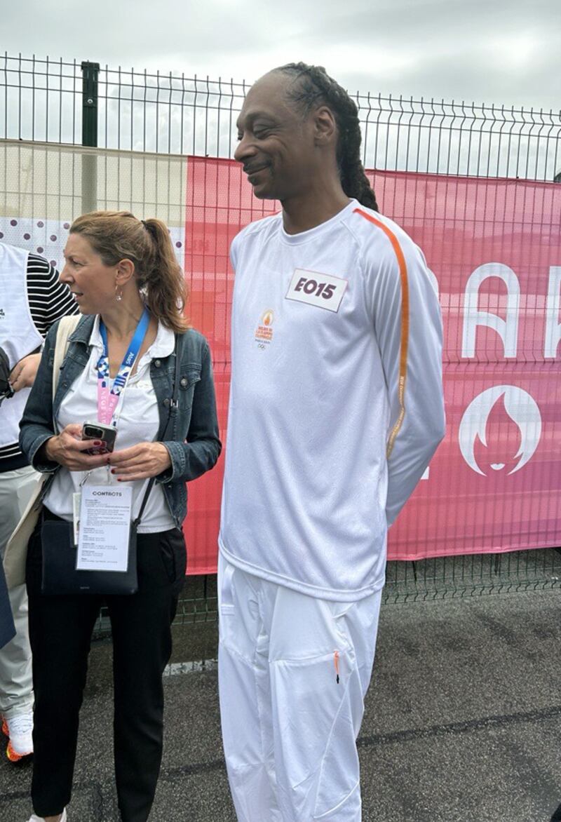 Snoop Dogg before he was handed the Olympic torch on its final leg of the relay