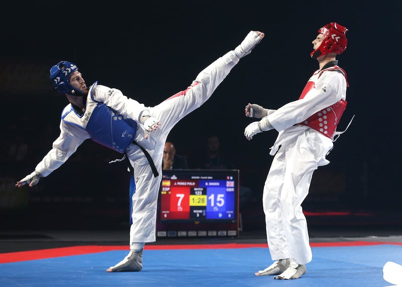 Bradly Sinden (Blue) and Spain’s Javier Perez Polo at the European Taekwondo Championships in 2022