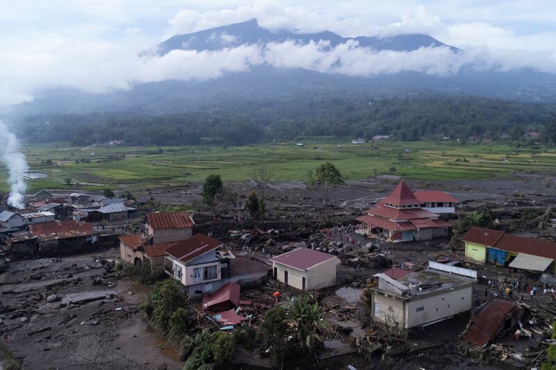 Damage at a village affected by a flash flood in Agam, West Sumatra (Sutan Malik Kayo/AP)