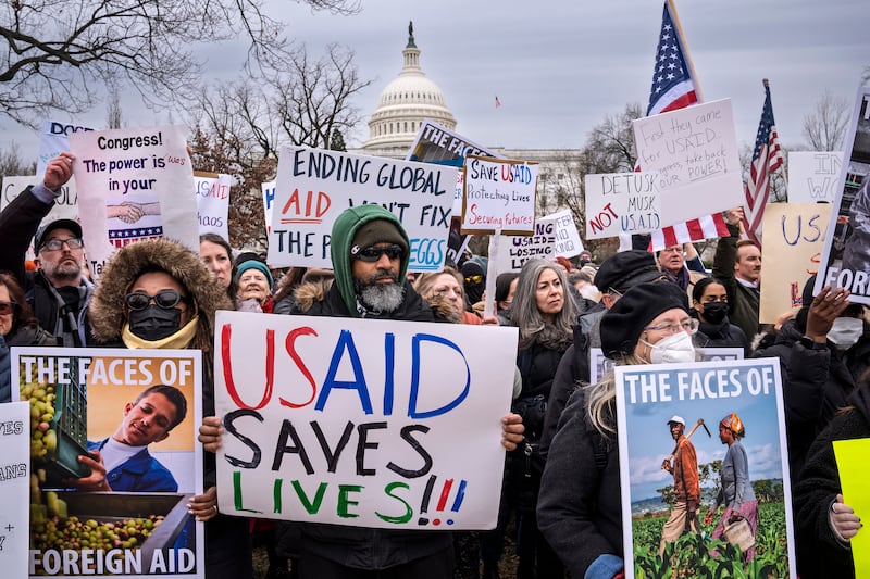 The new US administration has frozen funding for USAID, the world’s largest aid provider, prompting protests. (J Scott Applewhite/AP)