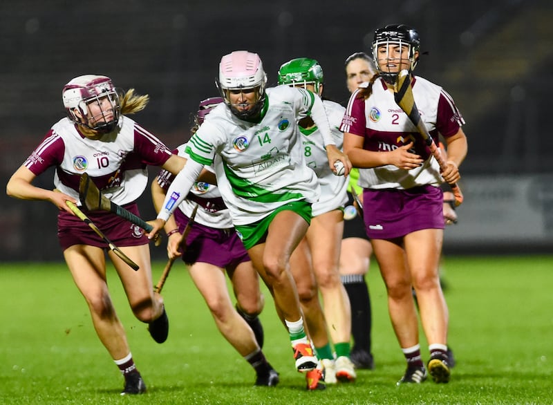 Granemore's Rachel Merry being chased by Ballymacnab players during the Armagh senior camogie final