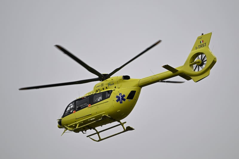 An ambulance helicopter takes off from the elementary school following the knife attack (Damir Krajac/AP)