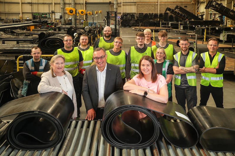 Roseann Kelly, Don Leeson, and Jayne Peters, pictured with the production team at Smiley Monroe, Lisburn.