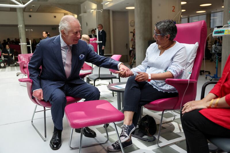 The King, patron of Cancer Research UK and Macmillan Cancer Support, meeting patient Asha Millan at University College Hospital Macmillan Cancer Centre in April