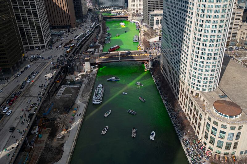 The Chicago River is dyed green for St Patrick’s Day celebrations in the US (Erin Hooley/AP)