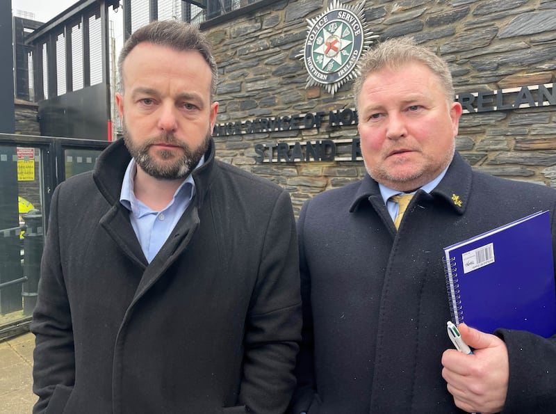 Lawyer Ciaran Sheils with SDLP leader Colum Eastwood, who was asked to attend an interview under caution