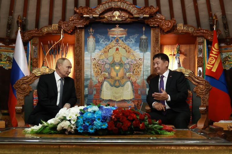 Russian President Vladimir Putin and Mongolian President Ukhnaagiin Khurelsukh at the Saaral Ordon Government Building in Ulaanbaatar, Mongolia (Vyacheslav Prokofyev, Sputnik, Kremlin Pool Photo via AP)