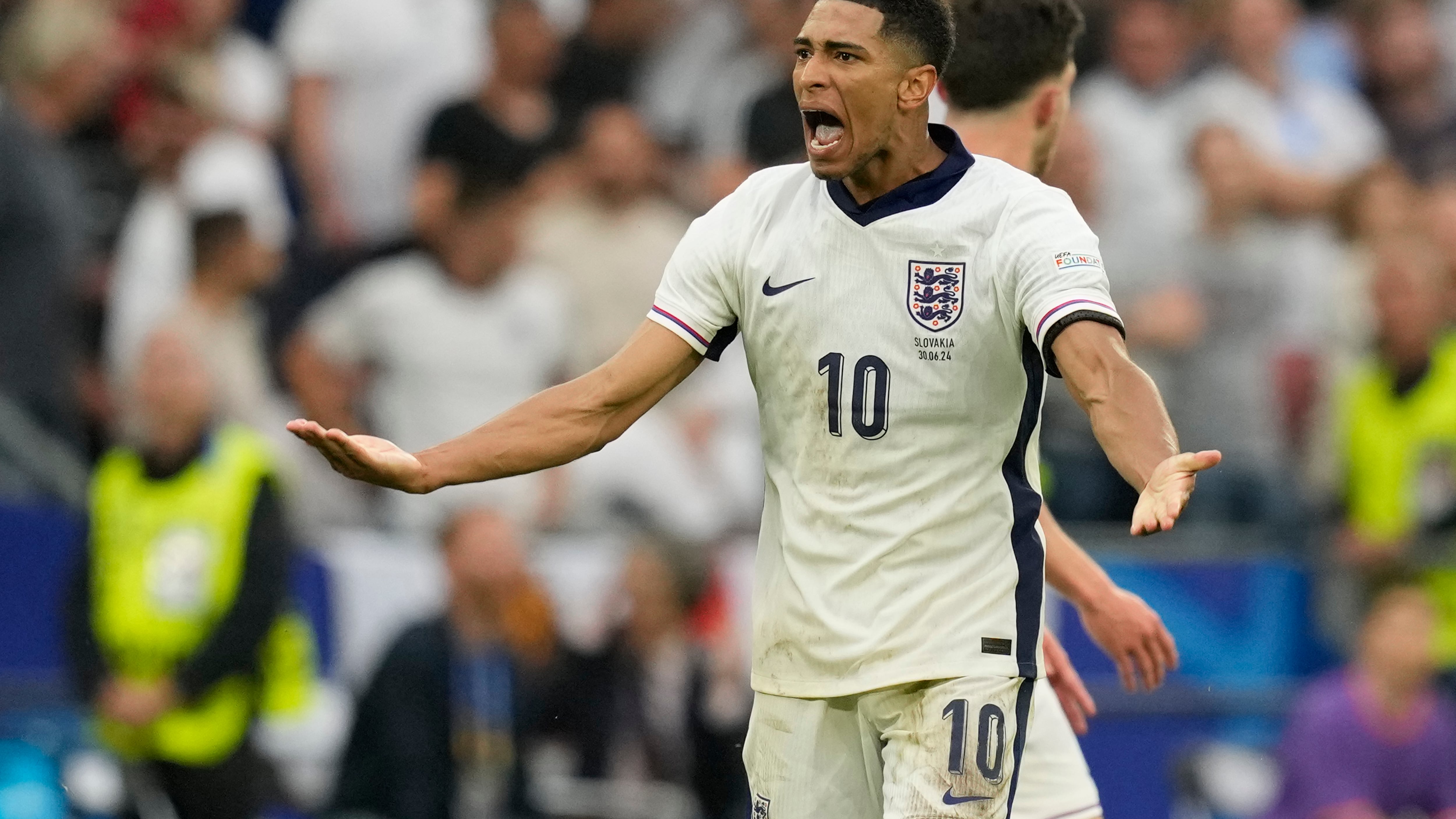 England’s Jude Bellingham celebrates after scoring against Slovakia (Antonio Calanni/AP)