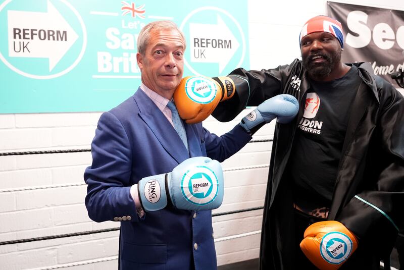 Reform UK leader Nigel Farage and boxer Derek Chisora at a boxing gym in Clacton