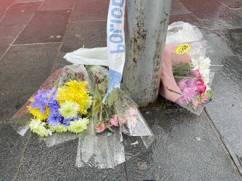 Floral tributes have been left close to the scene