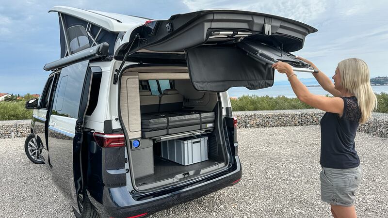 The fold-out seats are stored in the boot door