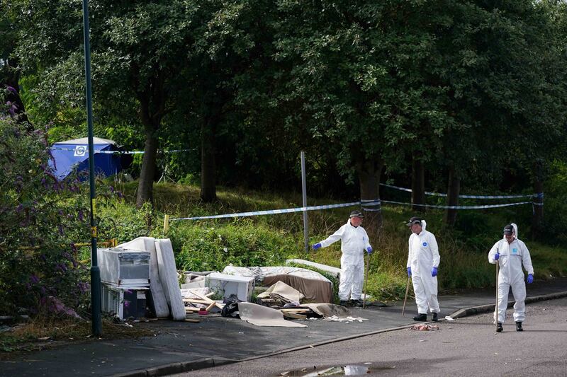 Forensic officers at the scene on August 2 2023