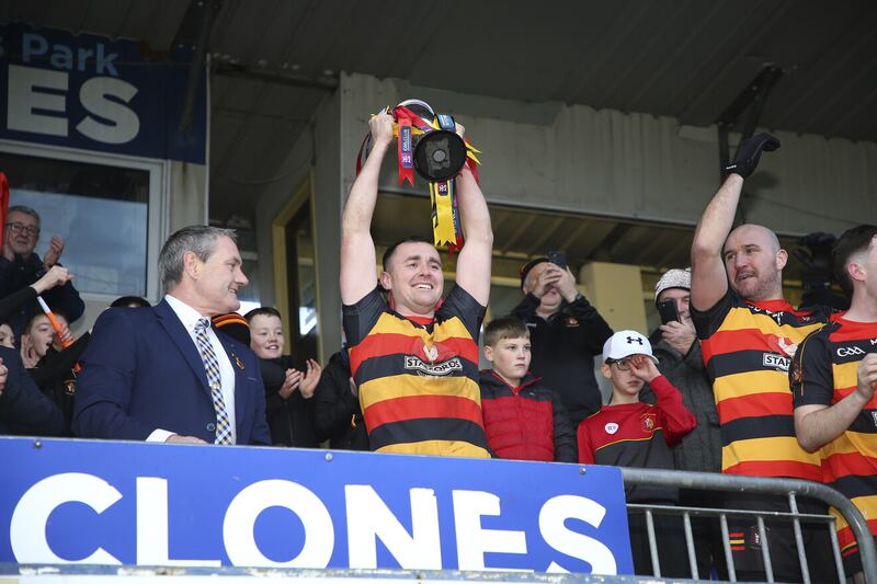 Cullyhanna captain Pearse Casey lifts the Packie McCully Cup as Ulster Club IFC winners.