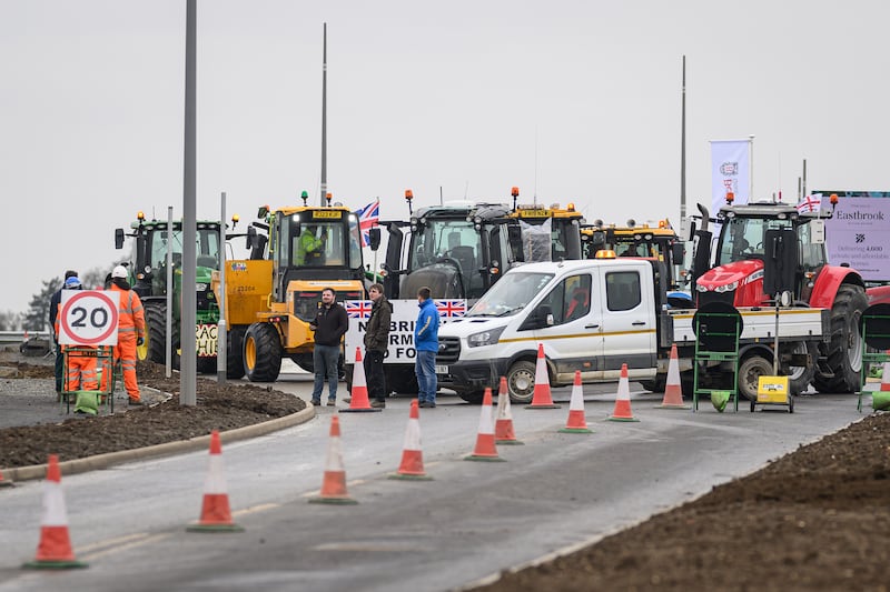 Farmers gathered outside the building site where Sir Keir Starmer was on an official visit