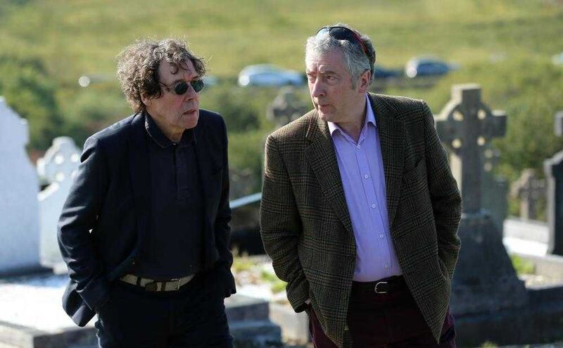 Actor Stephen Rea (left) and composer Neil Martin attend the funeral of playwright Brian Friel in Co Donegal.  Picture by Niall Carson, Press Association 