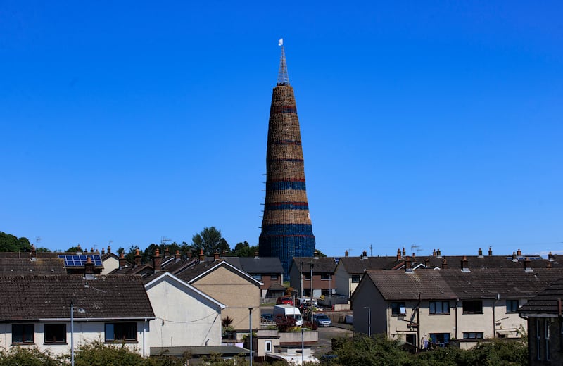 Craigyhill bonfire in Larne, Co. Antrim which is estimated to be 200 feet or 60 meters tall. The burning of loyalist bonfires is part of the traditional Twelfth commemorations marking the anniversary of the Protestant King William's victory over the Catholic King James at the Battle of the Boyne in 1690. Picture date: Monday July 8, 2024. PA Photo. See PA story ULSTER Twelfth. Photo credit should read: Liam McBurney/PA Wire