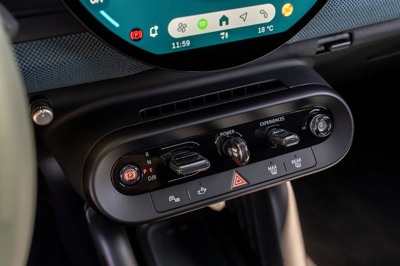 The toggle switches remain the same with seven different drive modes. (Mini)