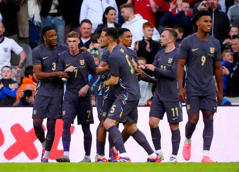 Cole Palmer (second left) marked his first start with a maiden international goal