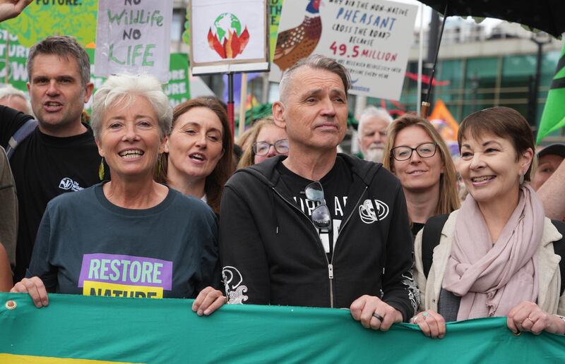 Dame Emma Thompson, Dale Vince and Caroline Lucas during a Restore Nature Now protest in central London