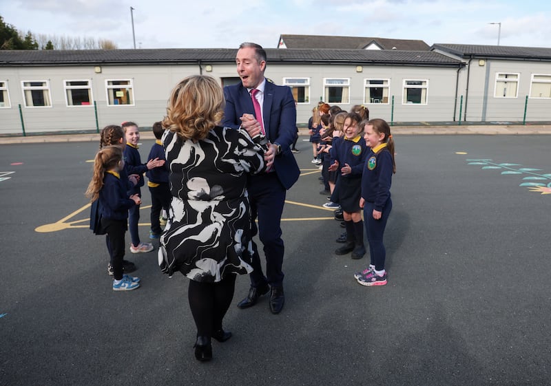 Education Minister Paul Givan takes part in a Ceili, with pupils at Gaelscoil Aodha Rua during his first visit to an Irish language school as Minister.
PICTURE COLM LENAGHAN