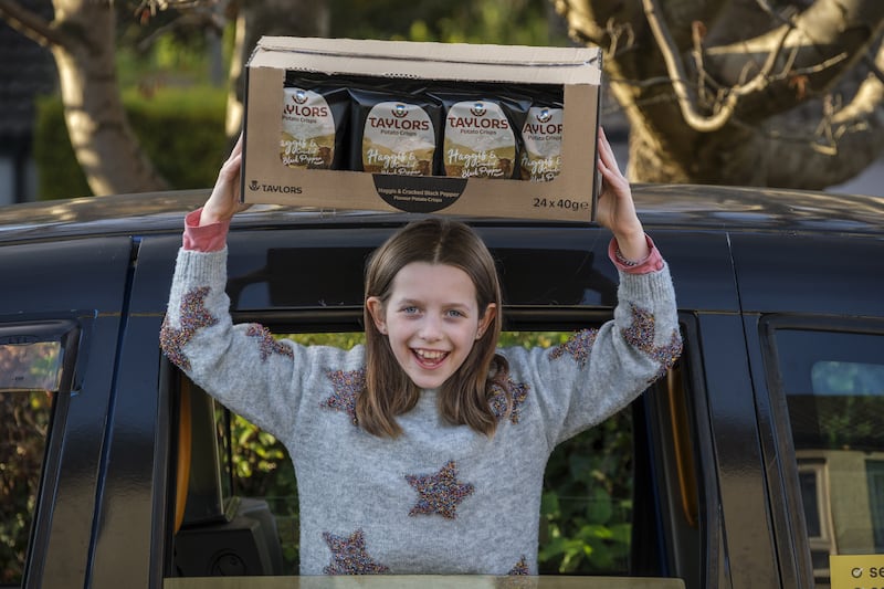 Grace, from Edinburgh, with her year’s supply of haggis crisps