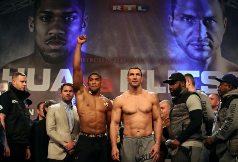 Anthony Joshua and Wladimir Klitschko during the Weigh In at Wembley Arena, London.