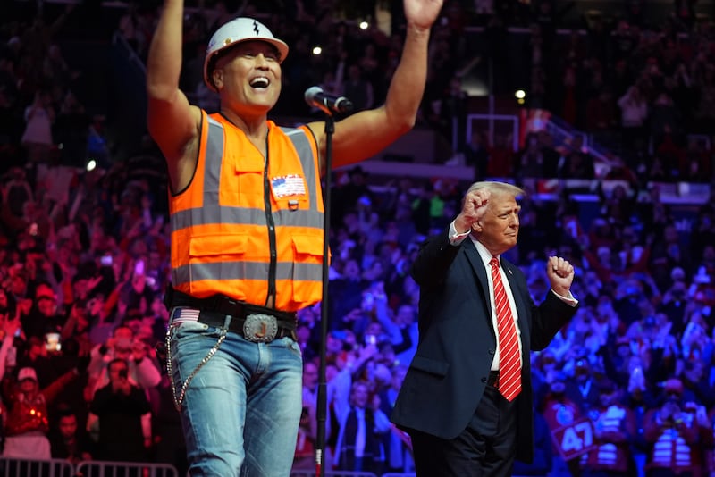 Mr Trump danced on stage with The Village People at a rally ahead of the 60th Presidential Inauguration (AP)