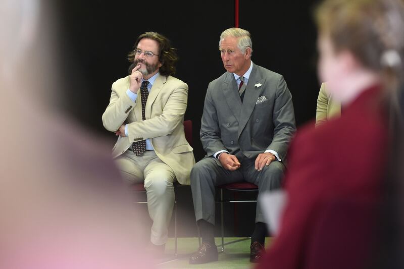 Charles watches a performance of Henry IV Part I by secondary school students from Stratford-up-Avon alongside artistic director Gregory Doran (left) at The Royal Shakespeare Theatre