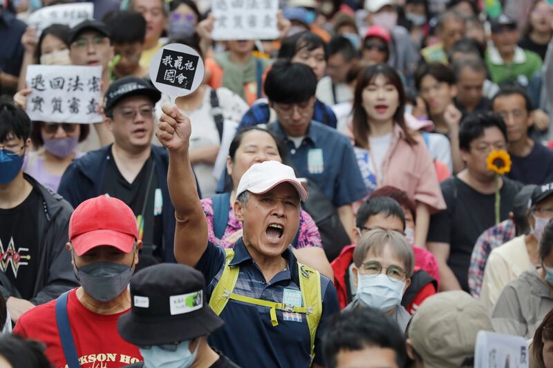 Supporters of the Democratic Progressive Party gather in Taipei (Chiang Ying-ying/AP)