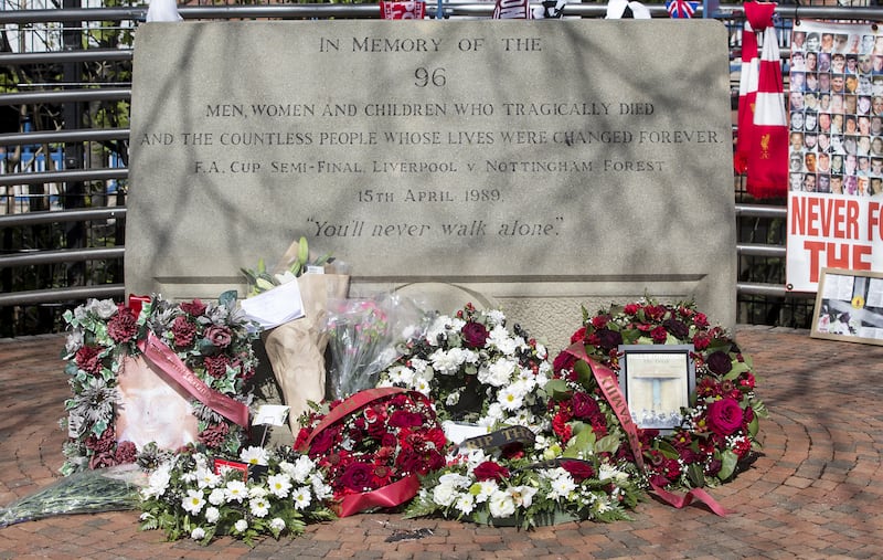 Flowers placed at the Hillsborough memorial plaque