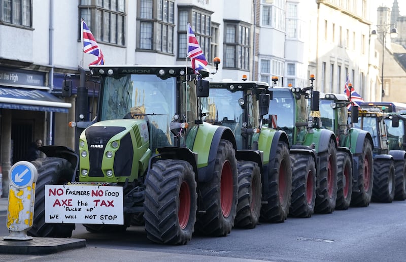 Farmers protest over the changes to inheritance tax rules outside the Oxford Farming Conference