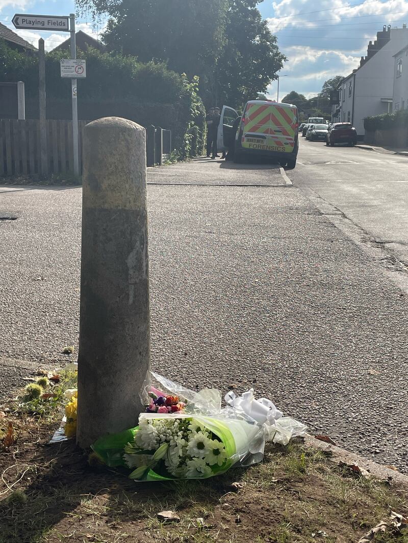 Floral tributes were left outside the scene in Mr Price’s memory