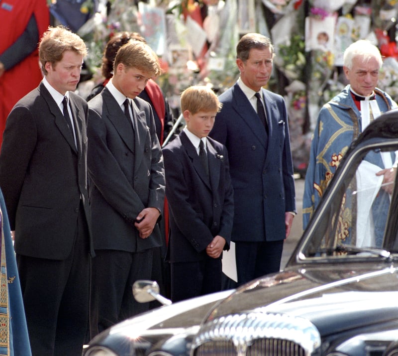 Earl Spencer, William, Harry, and the-then Prince of Wales after Diana’s funeral in 1997