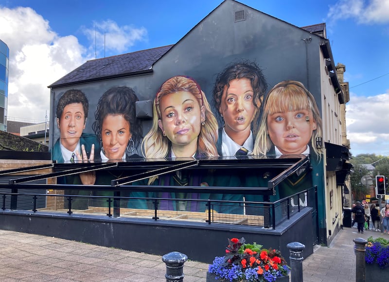 The famous Derry Girls mural now part covered up by Badgers Bar garden in Derry. The mural has become a major attraction in the city since the TV series. Picture Margaret McLaughlin 12-9-2024