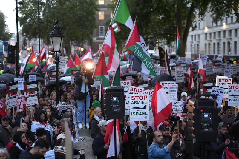 People during a pro-Palestine and pro-Lebanon protest on Whitehall in central London