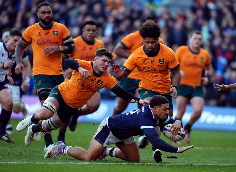 Tuipulotu breaks clear to score a try against Australia