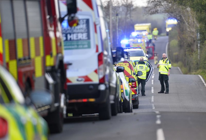 Emergency workers at the scene of the school bus crash near Bangor on Monday