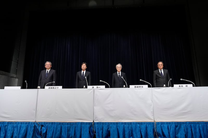 The executives faced the media in Tokyo (AP)