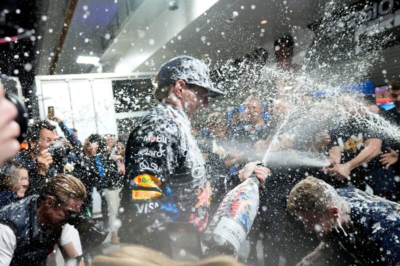 Max Verstappen celebrates his world title triumph (Matt York/AP).