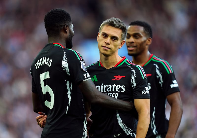 Leandro Trossard, right, is congratulated by Thomas Partey after opening the scoring