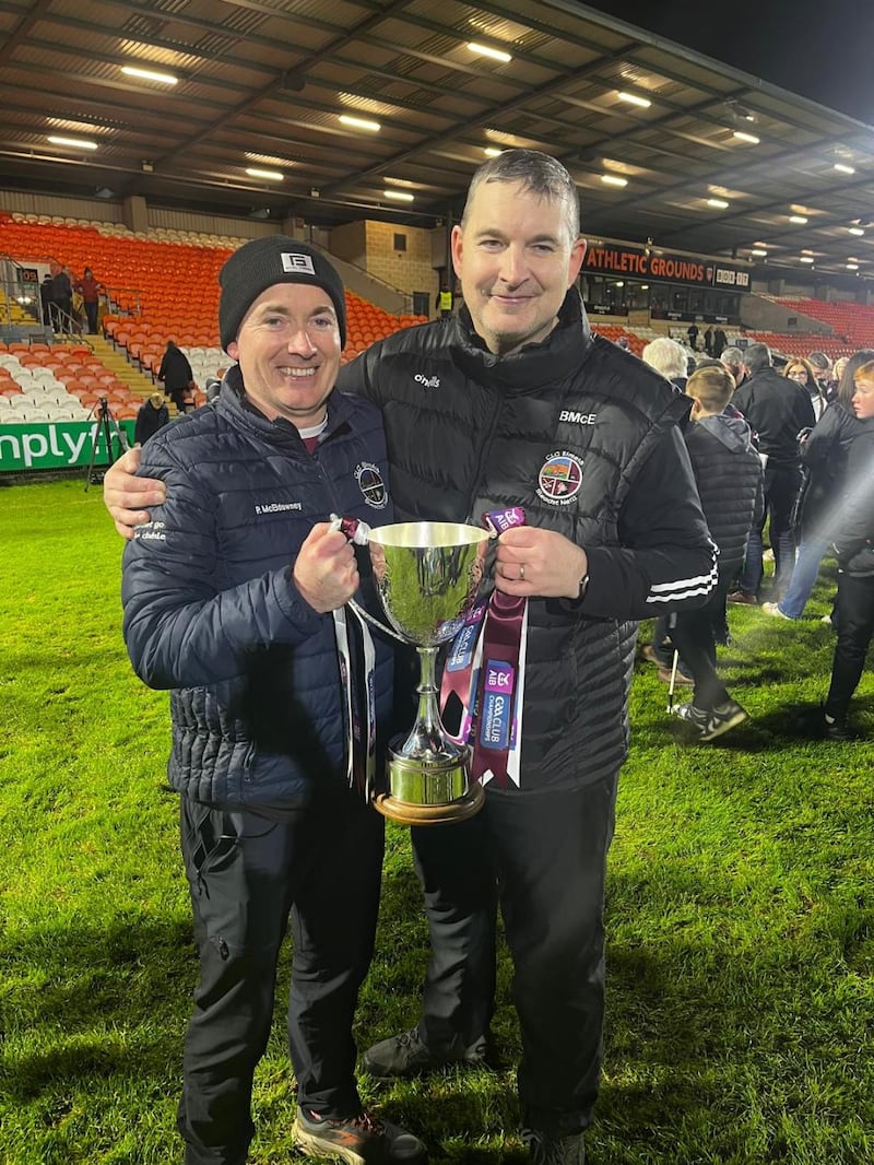 Barney McEldowney (right) with his brother and fellow backroom team member Patrick after Sleacht Néill won this season's Ulster Club Championship